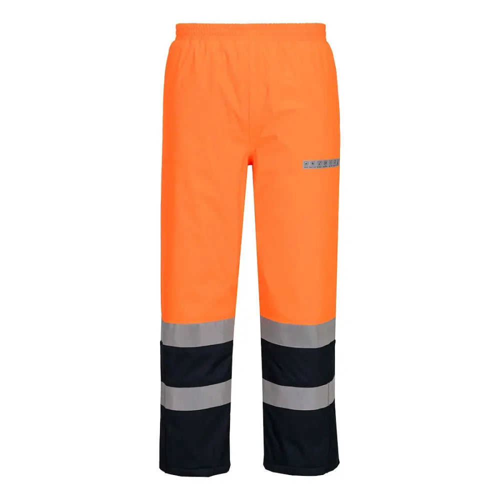 Portwest Bizflame Rain+ Hi-Vis Multi-Normi Kontrasti FR vuorelliset talvihousut FR434 - Oranssi/navy / XL - Työhousut